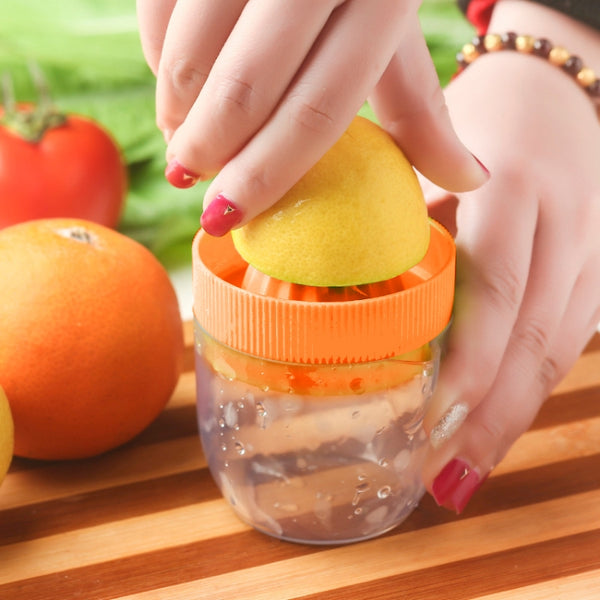 Multi-function Manual Mini Lemon Juicer with a Graduation Cup Juicer